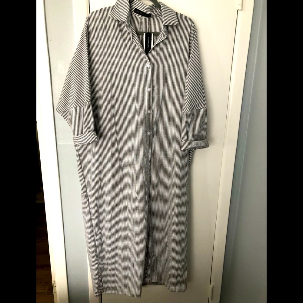 Brand New long linen dress runs very big;